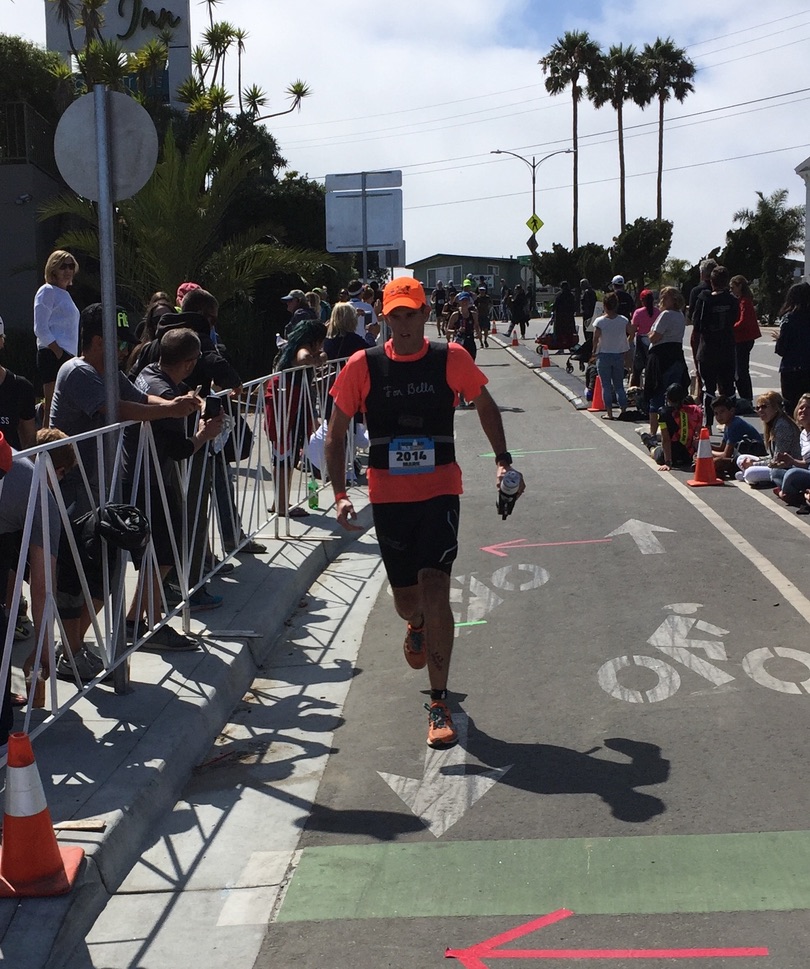 Mark running in the 2016 triathlon wearing the Beare It For Bella weighted vest
